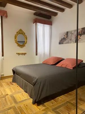 Letto o letti in una camera di Ca' degli Specchieri - A due passi da Piazza San Marco