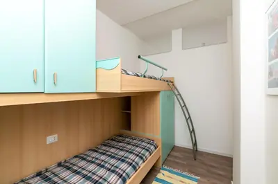 Letto o letti in una camera di Residence Vera Cruz