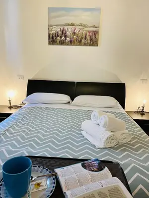 Letto o letti in una camera di Tre Archi your apartment