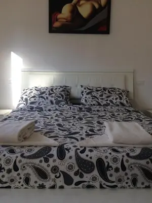 Letto o letti in una camera di Mechai Boatto Tumpat