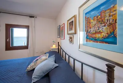 Letto o letti in una camera di Dimora Rubino - Isola di Pellestrina Ve