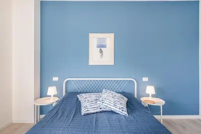 Letto o letti in una camera di GuestHost - Family & Friends Rooms with shared bathroom