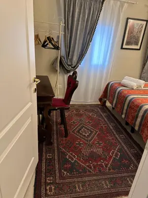 Letto o letti in una camera di Familly rooms (two rooms) Cà del Traghetto