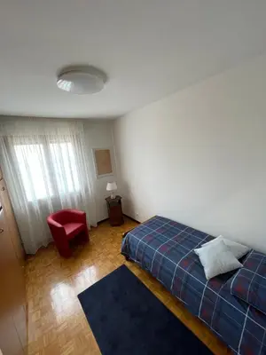 Letto o letti in una camera di Bellavista