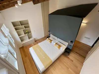 Letto o letti in una camera di Attico Vivit 60