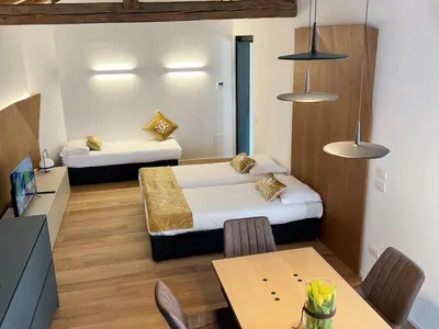 Letto o letti in una camera di Attico Vivit 60