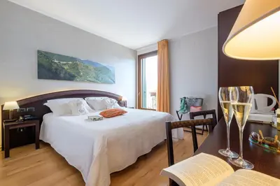 Letto o letti in una camera di Wine Hotel San Giacomo Activity & Wellness