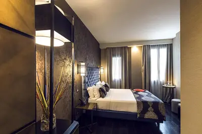Letto o letti in una camera di The Venice Times