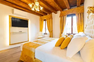 Letto o letti in una camera di Laguna D'oro Luxury Apartments