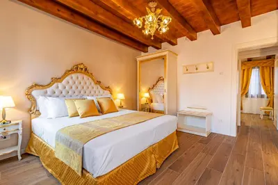 Letto o letti in una camera di Laguna D'oro Luxury Apartments