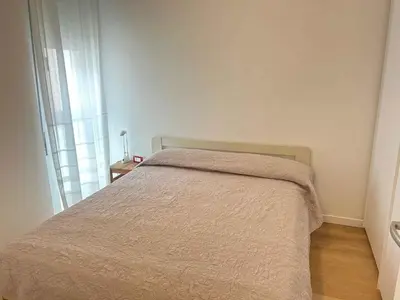 Letto o letti in una camera di Apartment in Lido di Jesolo 41095