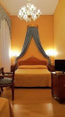 Letto o letti in una camera di Hotel Locanda Canal