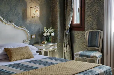 Letto o letti in una camera di Antica Locanda al Gambero