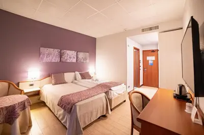 Letto o letti in una camera di Hotel all'Orso