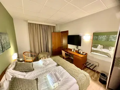 Letto o letti in una camera di Hotel all'Orso