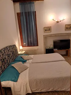 Letto o letti in una camera di Locanda Ca' Formosa