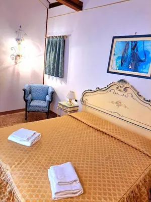 Letto o letti in una camera di Locanda Ca' Formosa