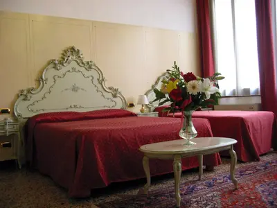 Letto o letti in una camera di Guesthouse Ca' San Marcuola 1
