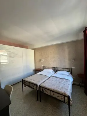 Letto o letti in una camera di Residence Giove