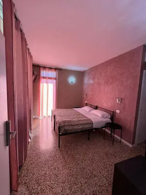 Letto o letti in una camera di Residence Giove