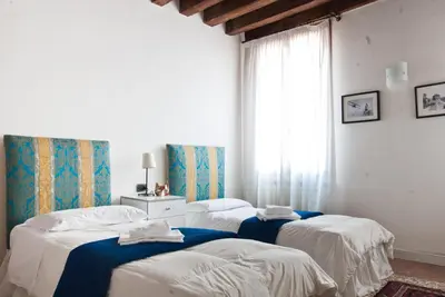 Letto o letti in una camera di Grimaldi Apartments Cannaregio
