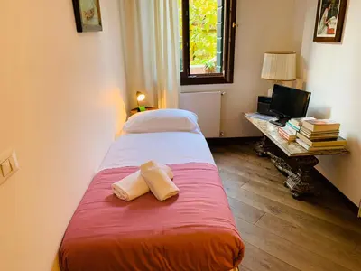 Letto o letti in una camera di Grimaldi Apartments Cannaregio