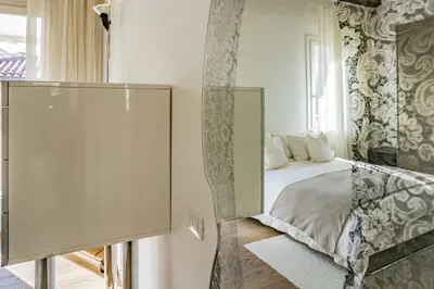 Letto o letti in una camera di Colleoni Apartment with 2 Superb Terraces