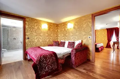Letto o letti in una camera di Hotel Casanova
