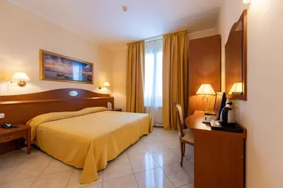 Letto o letti in una camera di Hotel Ambasciata Venice - Atika & Atif
