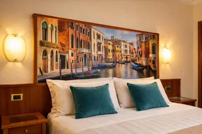 Letto o letti in una camera di Hotel President Venezia