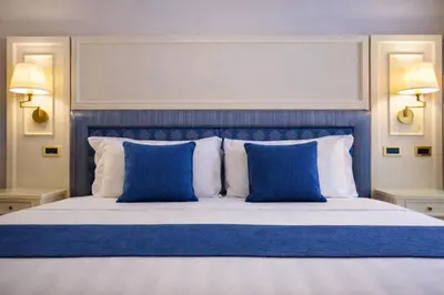 Letto o letti in una camera di Hotel President Venezia