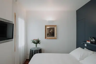 Letto o letti in una camera di Bed and Breakfast Canalgrande