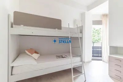 Letto o letti in una camera di Condominio Trento