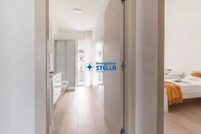 Letto o letti in una camera di Condominio Trento