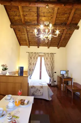 Letto o letti in una camera di Isola Di Caprera
