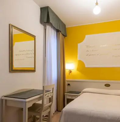 Letto o letti in una camera di Hotel Ca' Tron