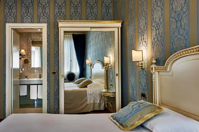 Letto o letti in una camera di Hotel Gardena