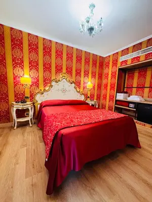 Letto o letti in una camera di Hotel al Graspo de Ua