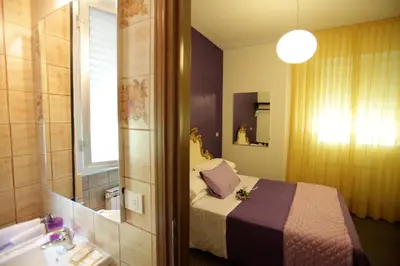 Letto o letti in una camera di Art Hotel