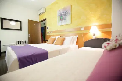 Letto o letti in una camera di Art Hotel