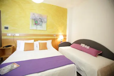 Letto o letti in una camera di Art Hotel