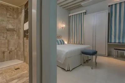Letto o letti in una camera di Relais Venezia
