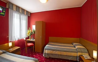 Letto o letti in una camera di Hotel Nazionale