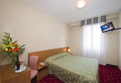 Letto o letti in una camera di Hotel Nazionale