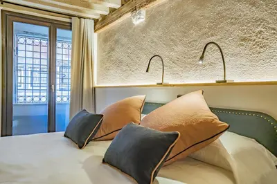 Letto o letti in una camera di Corte Rubbi 5514 Canal View
