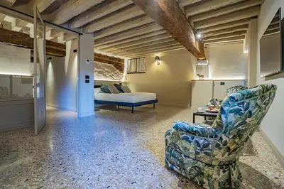 Letto o letti in una camera di Corte Rubbi 1 A True Canal-side Experience