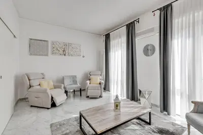 Area soggiorno di Elegant Blue Apartment