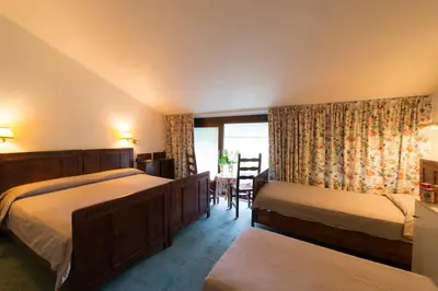 Letto o letti in una camera di Relais Leon d'Oro