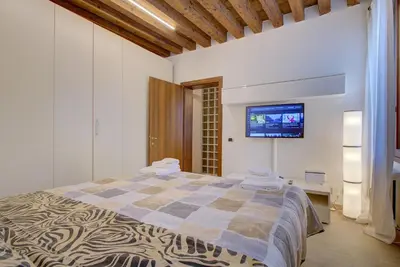 Letto o letti in una camera di RIALTO-STUA-MARKET