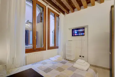 Letto o letti in una camera di RIALTO-STUA-MARKET